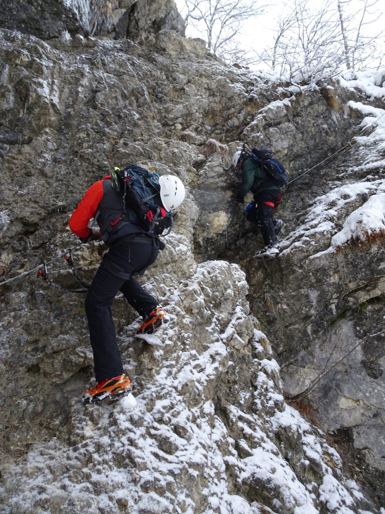 Hannes and Robert on the icy rock at the entrance