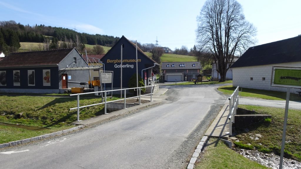 Pass by the mining museum (turn into this street)